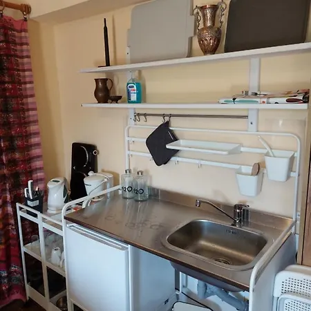 Korfes-κορφές αυτόνομη σουίτα με τζάκι στην κορφές * Karpenísion